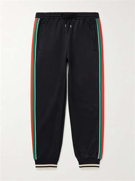 pantaloni tuta uomo gucci|Nuova collezione di pantaloni sportivi Gucci uomo su FARFETCH.